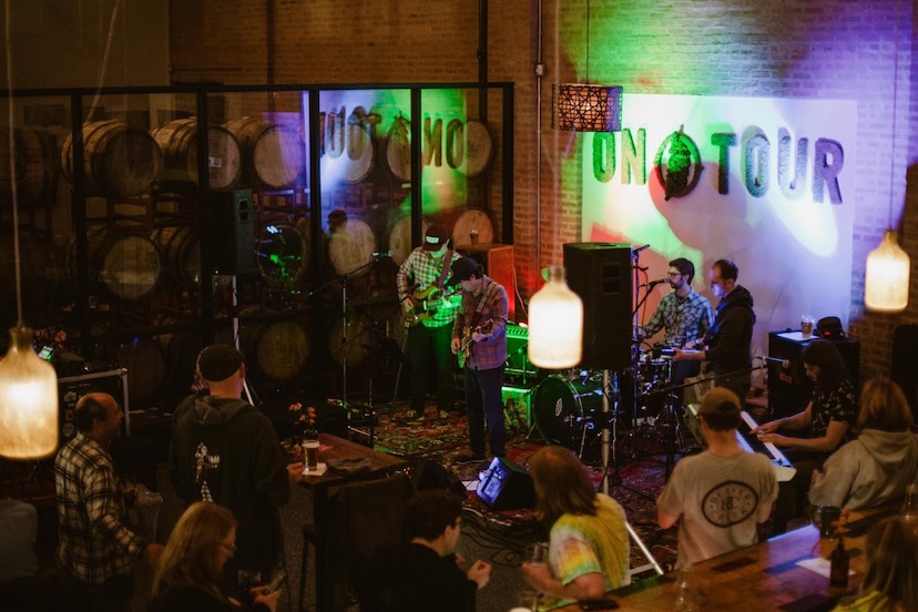 On Tour - band on stage - Illinois Brewing